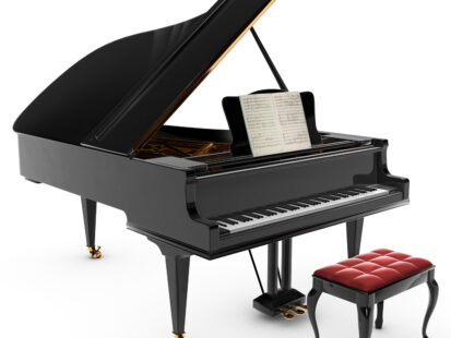 A beautiful classic grand pianio, Isolated on white.